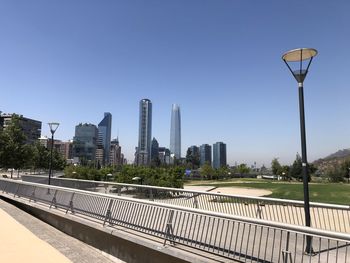 View of modern buildings against clear sky