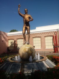 Statue of historic building against clear sky