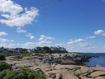 Scenic view of sea against blue sky