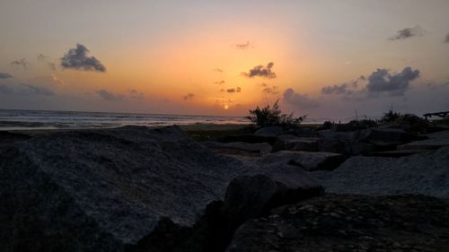 Scenic view of sea against sky during sunset