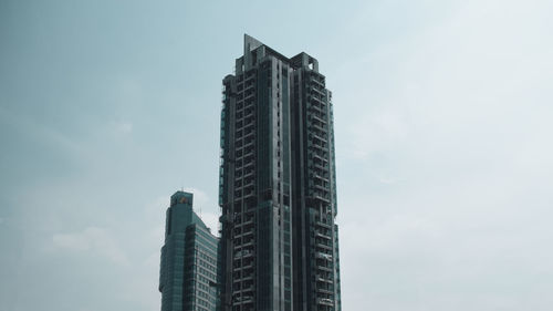 Low angle view of modern buildings against sky