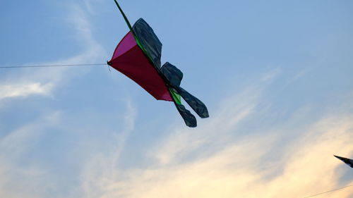 Low angle view of flag against sky