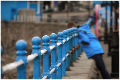 Close-up of blue railings