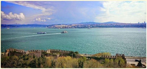 Scenic view of sea against cloudy sky