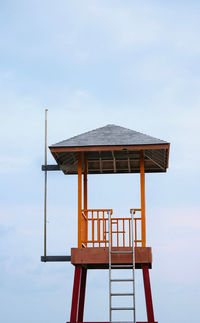 Low angle view of lifeguard hut against sky