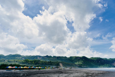 Scenic view of beach against sky