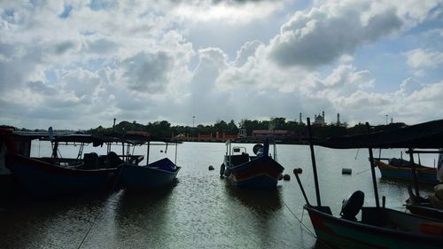 Boats moored in harbor