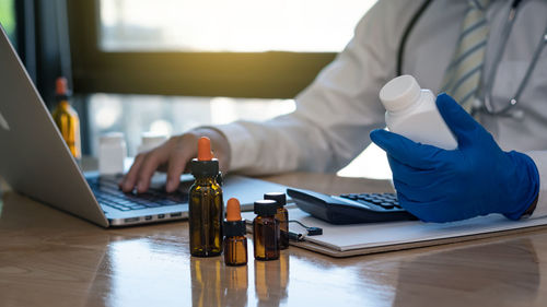 Man using laptop on table