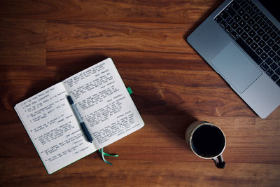High angle view of coffee cup on table