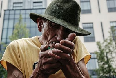 Close-up of a man with hand