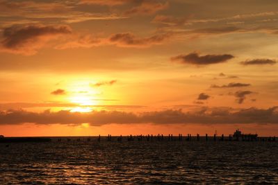 Scenic view of sea at sunset