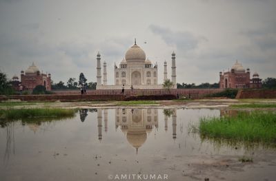 Reflection of building in lake water