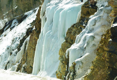 Scenic view of frozen waterfall