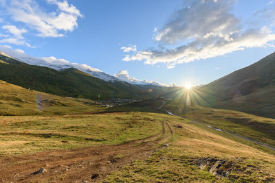 Scenic view of field against sky