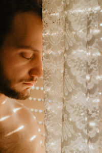 Portrait of young man in bathroom