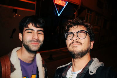 Close-up of male friends in nightclub