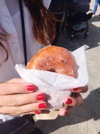 Cropped hand holding ice cream