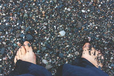 Barefoot on the autumn beach. unity with nature.