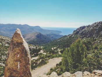 Scenic view of mountains against clear sky