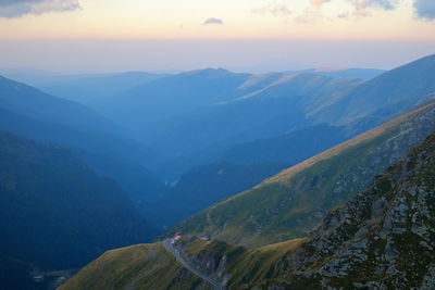 Sunrise on fagaras high mountain ridge. romanian mountain landscape with high peaks over 2200m