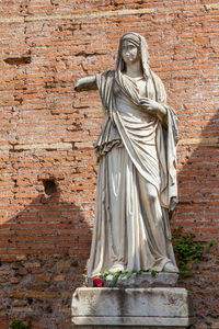 Ancient ruins of the house of the vestal virgins at the roman forum in rome