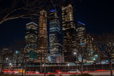 Illuminated city buildings at night