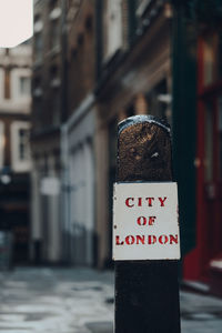 Close up of a city of london boundary post on a street in london, uk, selective focus.