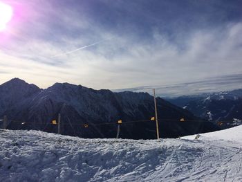 Snow covered mountain against sky