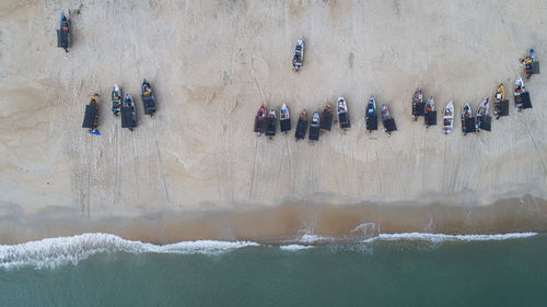 High angle view of boats moored on shore at beach