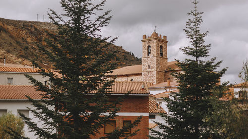 View of the village church and residential areas in a small mountain village.