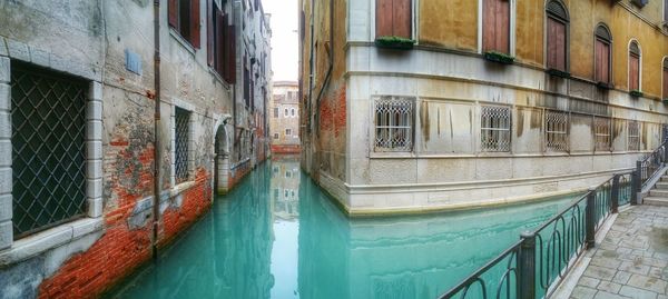 View of canal along buildings