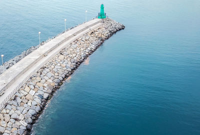 High angle view of groyne on beach