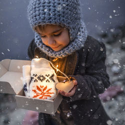 Portrait of smiling boy with christmas decoration