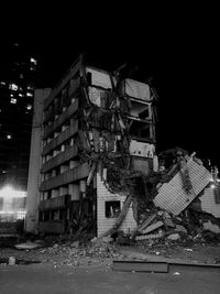 Buildings in city at night