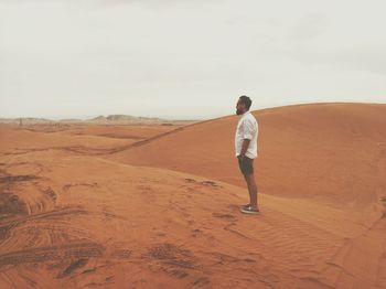 Man standing in desert