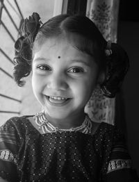 Portrait of cute girl at home