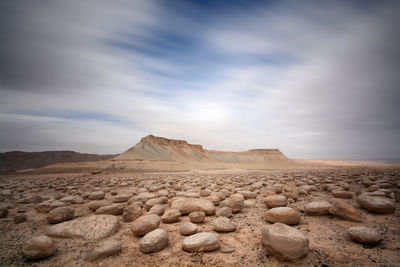 Scenic view of arid landscape against sky