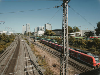 Train on railroad tracks against sky