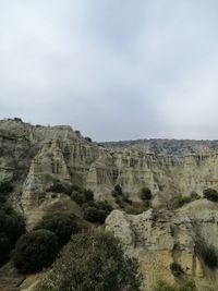 Scenic view of rocky mountains against sky