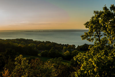 Scenic view of sea against sky at sunset