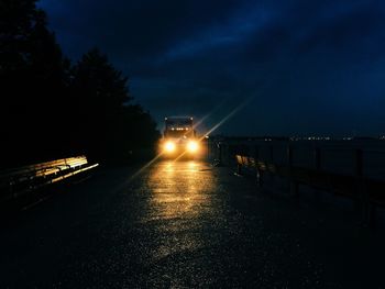 Illuminated street light at night