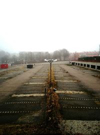 Railroad tracks against clear sky