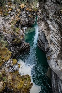 Aerial view of river amidst rock formations