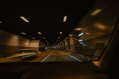 Close-up of car on road at night