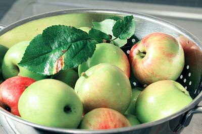 Close-up of apples in container