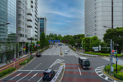 City street and modern buildings against sky