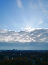 Aerial view of townscape against sky