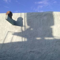 Shadow of people on wall