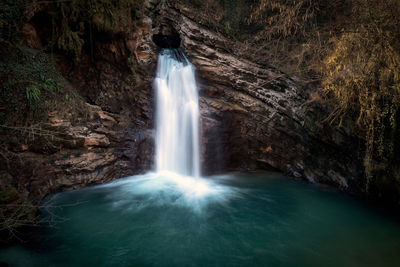 View of waterfall in forest