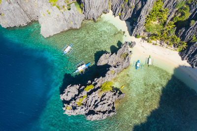 High angle view of rock formation in sea